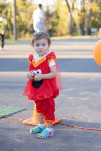 Girl in Elmo costume