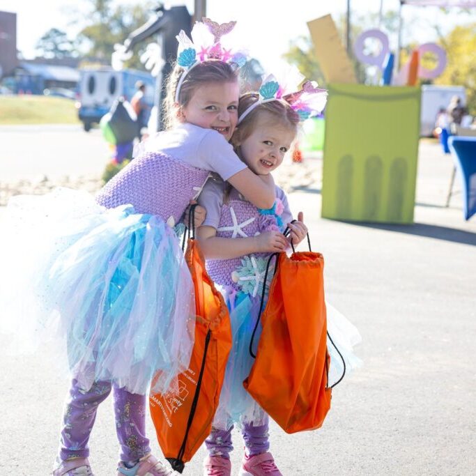 Two Kids Hugging each other